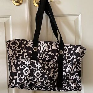 Thirty one black and white paisley organizing tote 8 pockets!  Great condition
